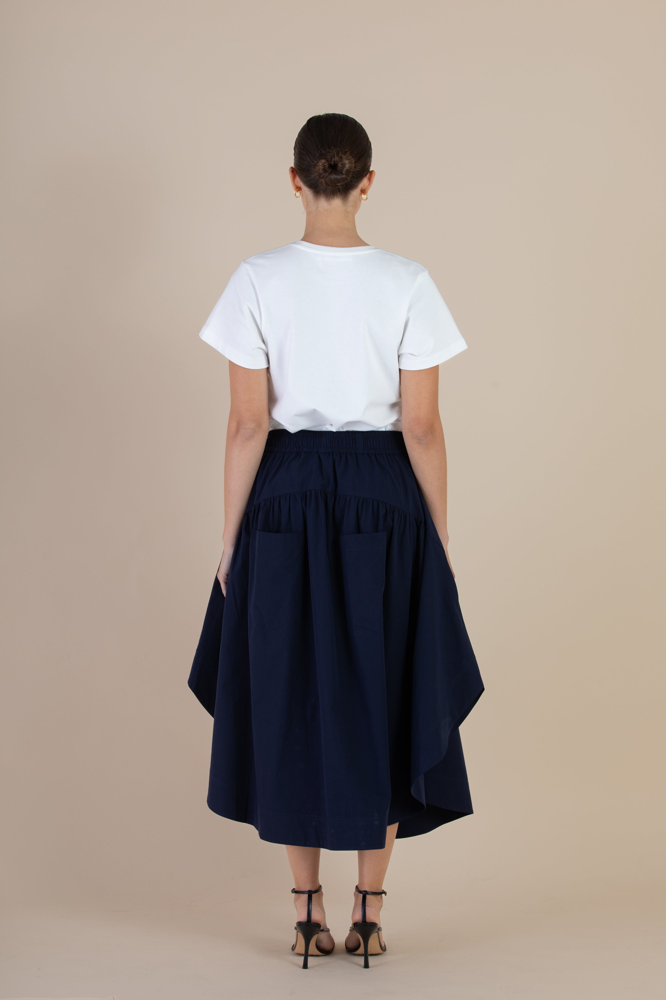 Back view of the SELFE Sawyer Skirt in Midnight – minimal skirt with sleek, elegant silhouette