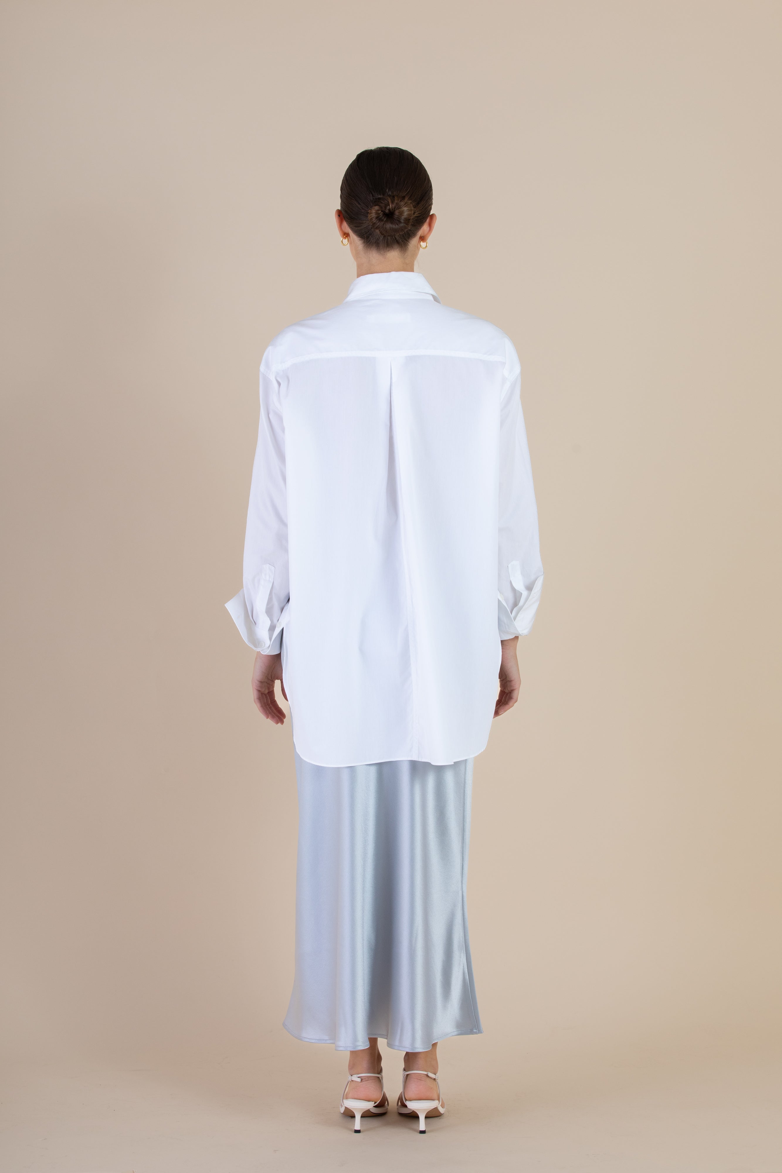 Back view of the SELFE Ida Shirt in White – relaxed cotton shirt with minimal silhouette