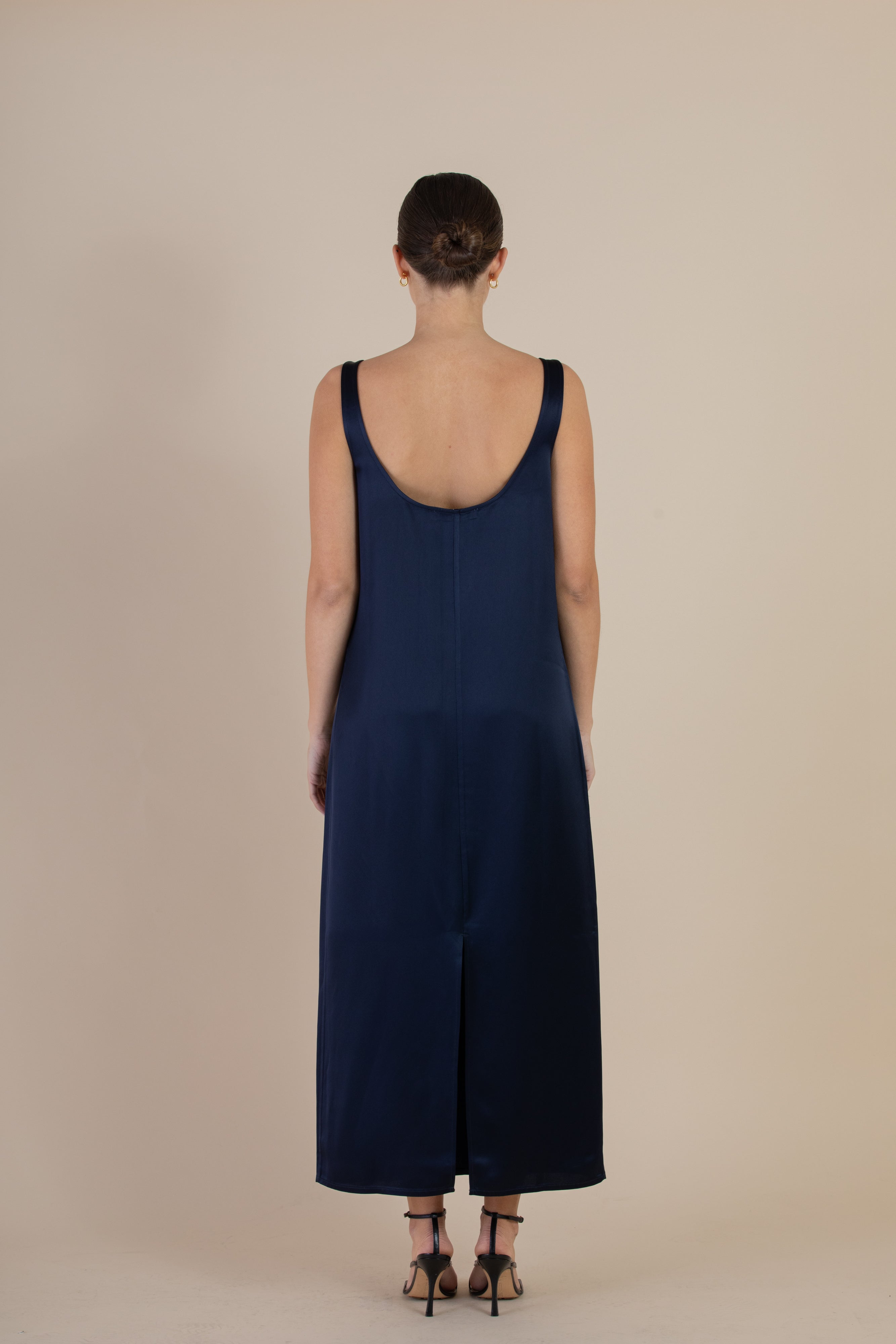 Back view of the SELFE Cora Slip Dress in Midnight – ankle-length slip dress with centre-back hem split