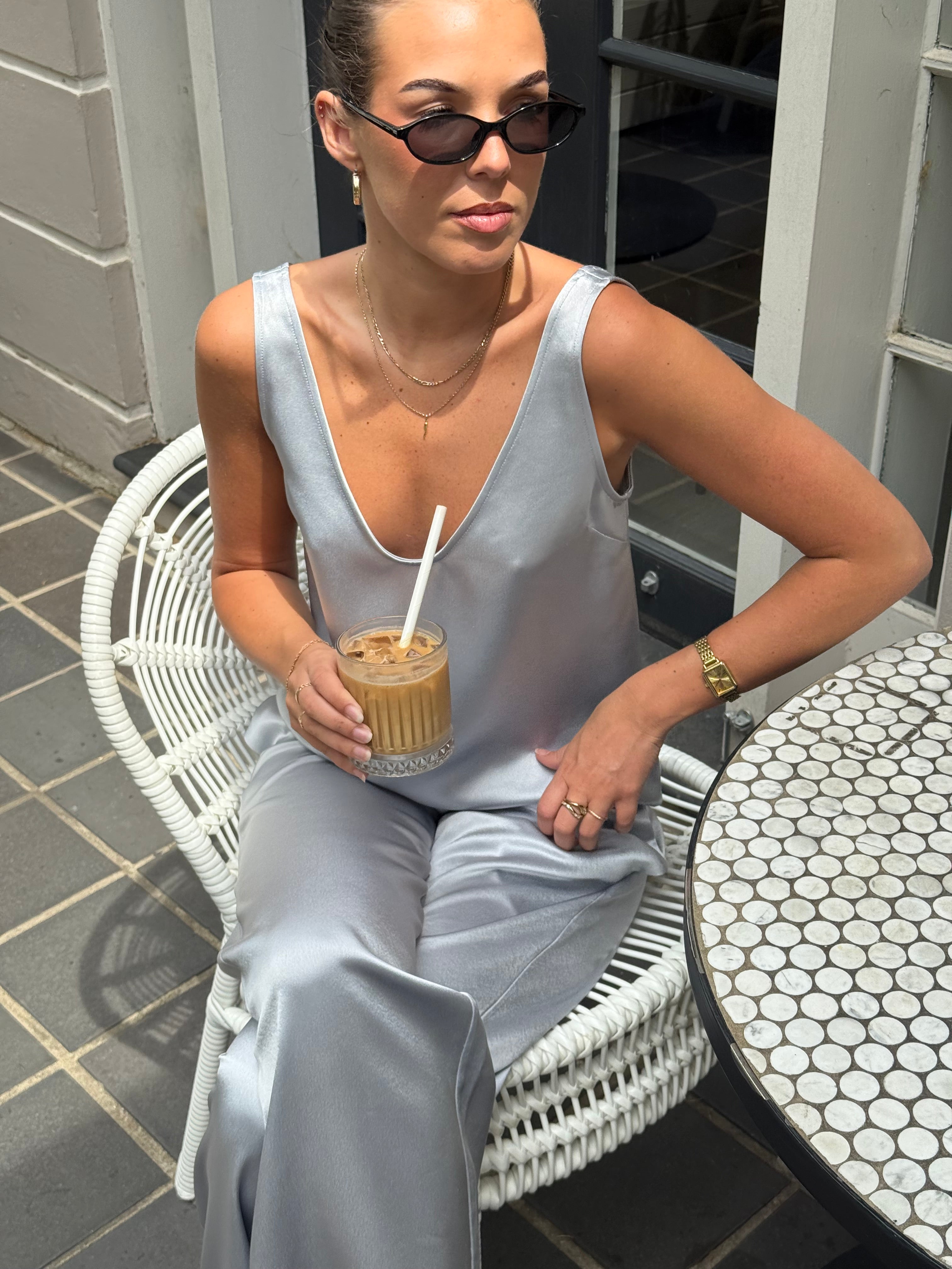 Adeline Satin Pant in Mystique styled as worn, showcasing the fluid satin fabric and elevated everyday silhouette.