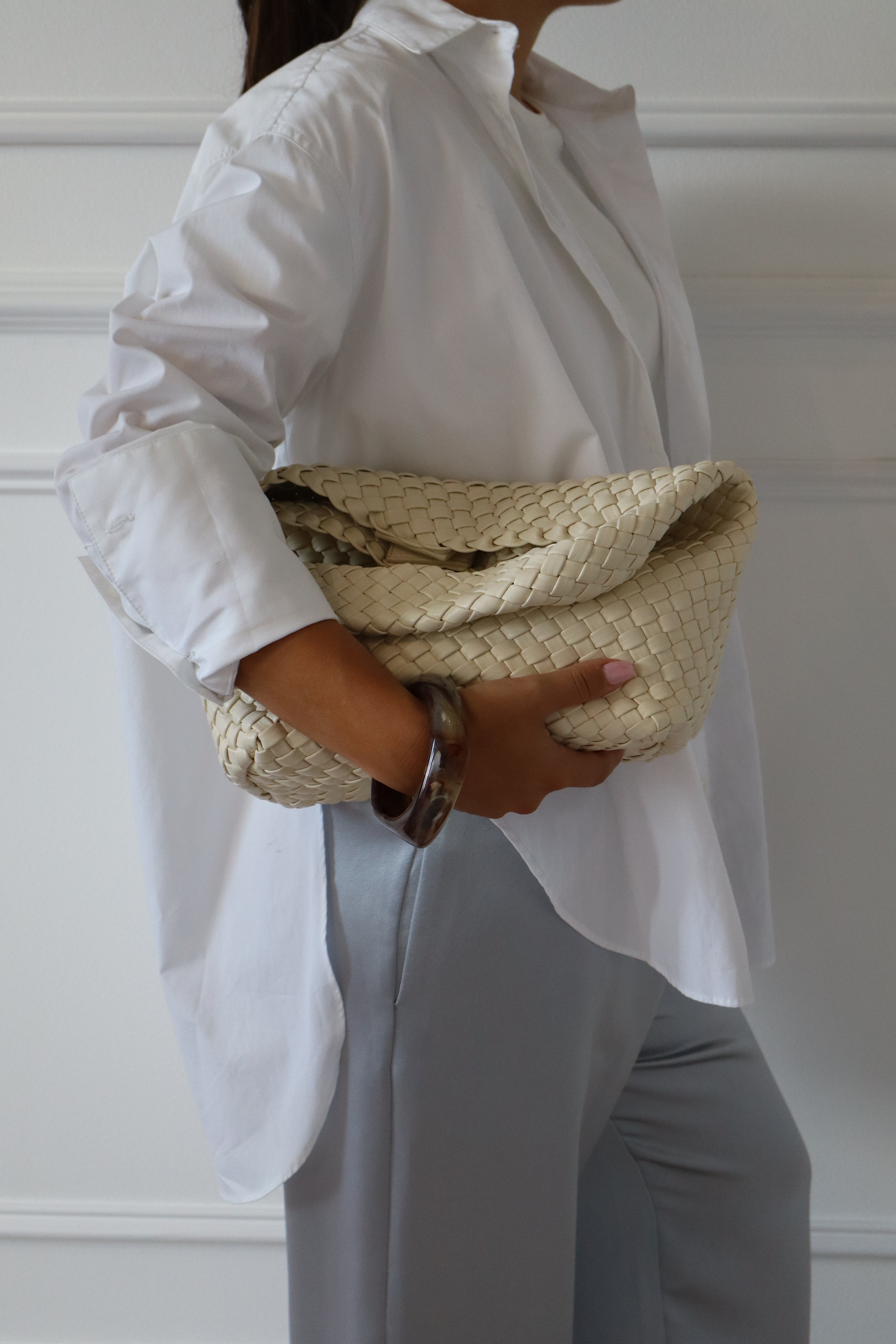 Detail of the SELFE Ida Shirt in White showing lightweight cotton fabric